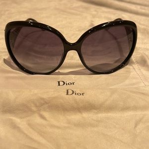 Christian Dior, rounded, cat eye sunglasses. Black Frame w grey gradient lens.